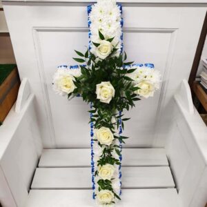 White rose and chrysanthemum funeral cross with blue ribbon edge