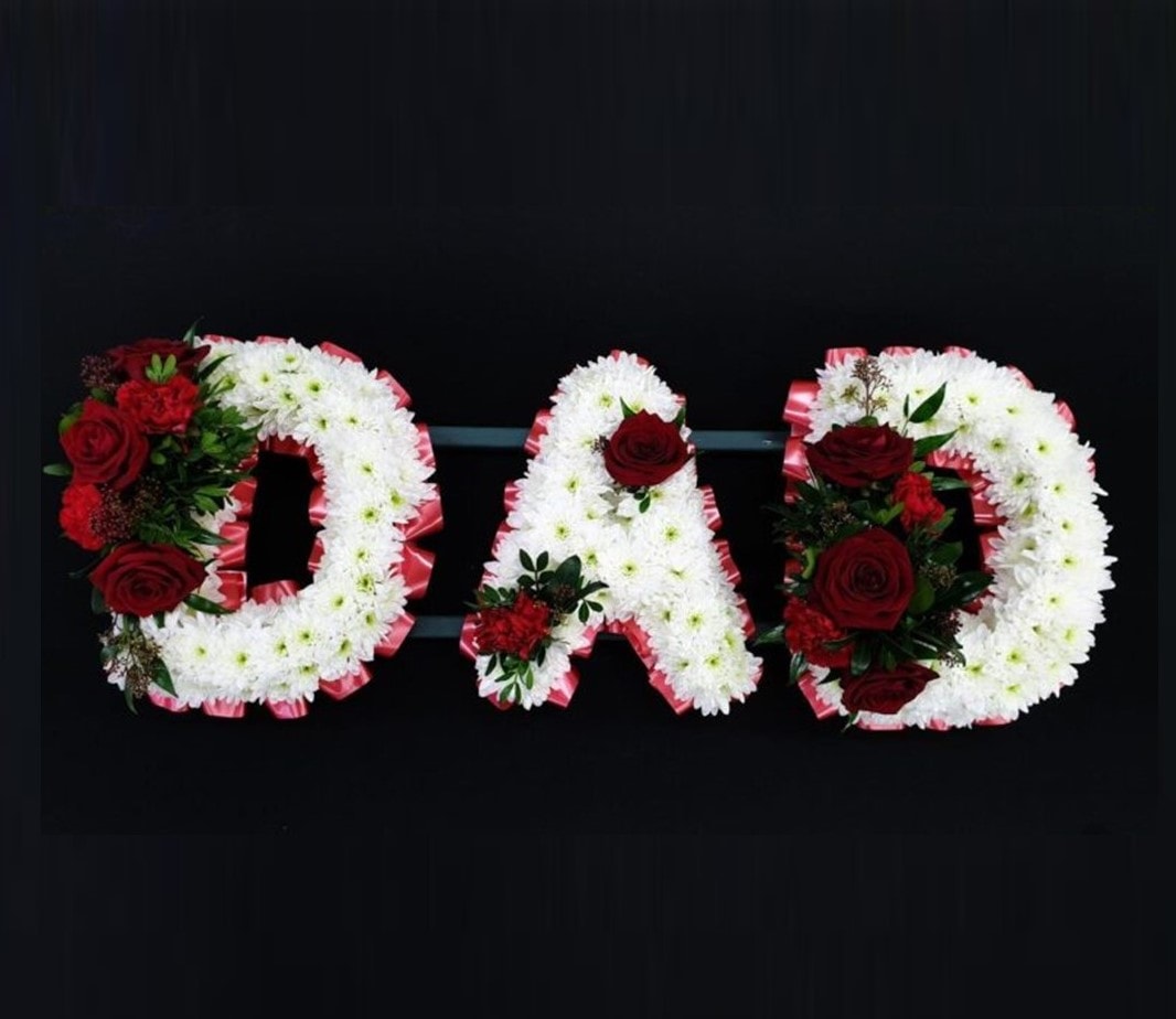 DAD funeral letter tribute with white chrysanthemums, pink ribbon edging and deep red roses