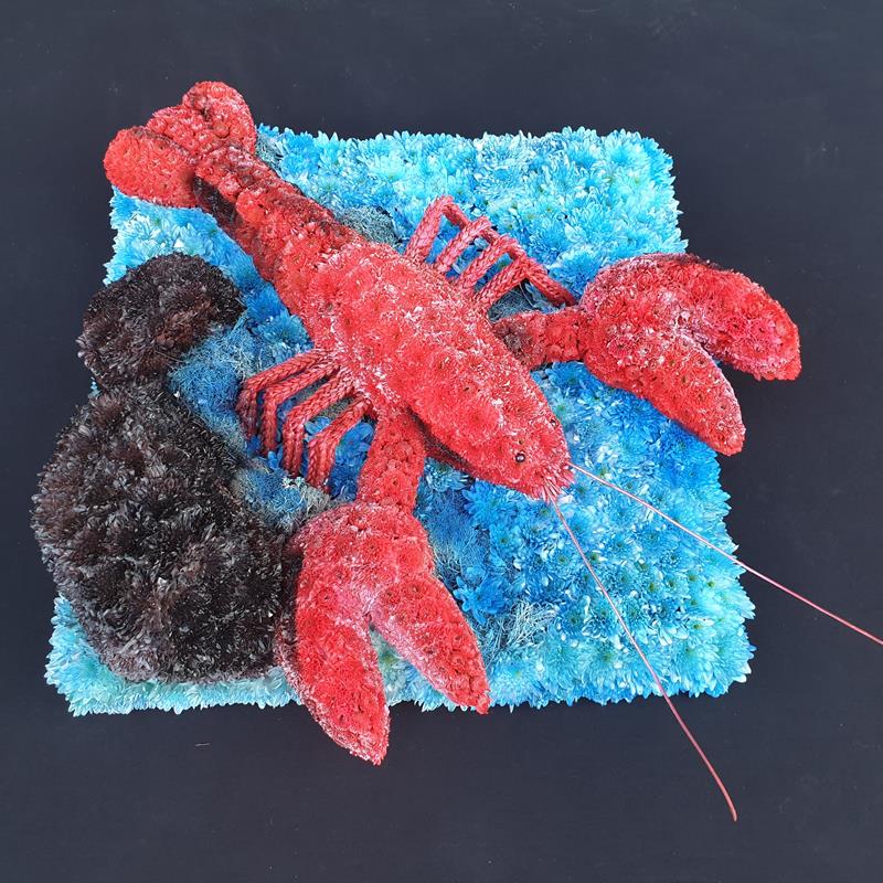 Funeral Lobster floral tribute with vibrant colours