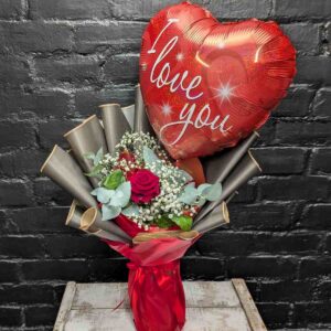 Single red rose arrangement with white Gypsophila, eucalyptus, and a large heart-shaped 'I Love You' balloon