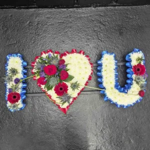 I Love You funeral tribute in red, white and blue with heart and chrysanthemum letters