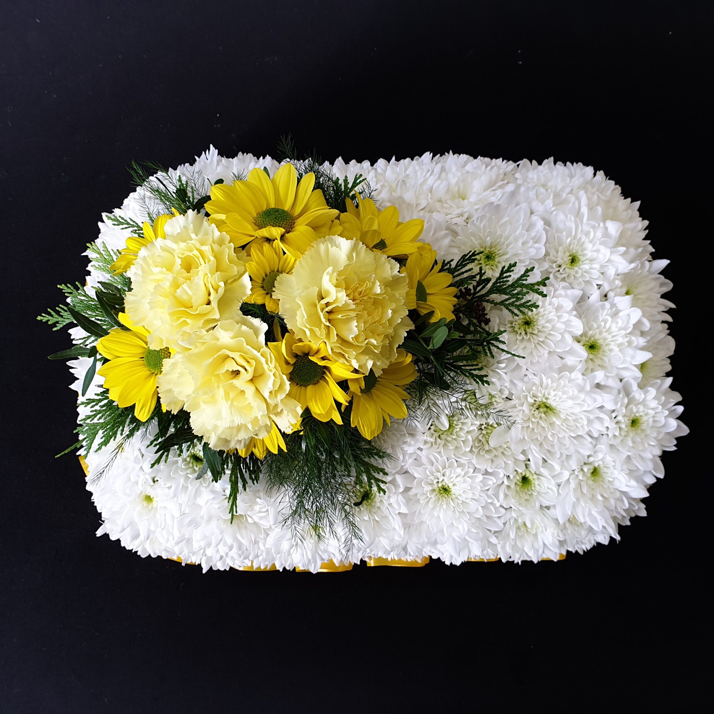 Miniature pillow with white chrysanthemums and yellow flowers