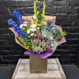 Scottish themed flower bouquet with thistles and heather