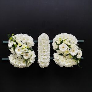 SIS funeral letter tribute in all white chrysanthemums and gerberas